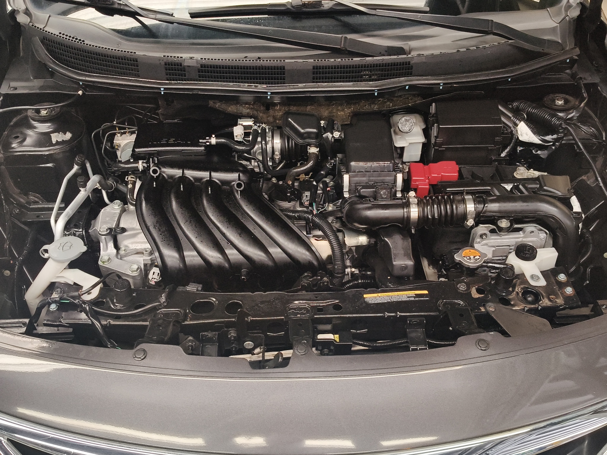 Nissan Versa 4 pts. Advance, TA, a/ac., VE, f. niebla, RA-16 (línea anterior) 2019