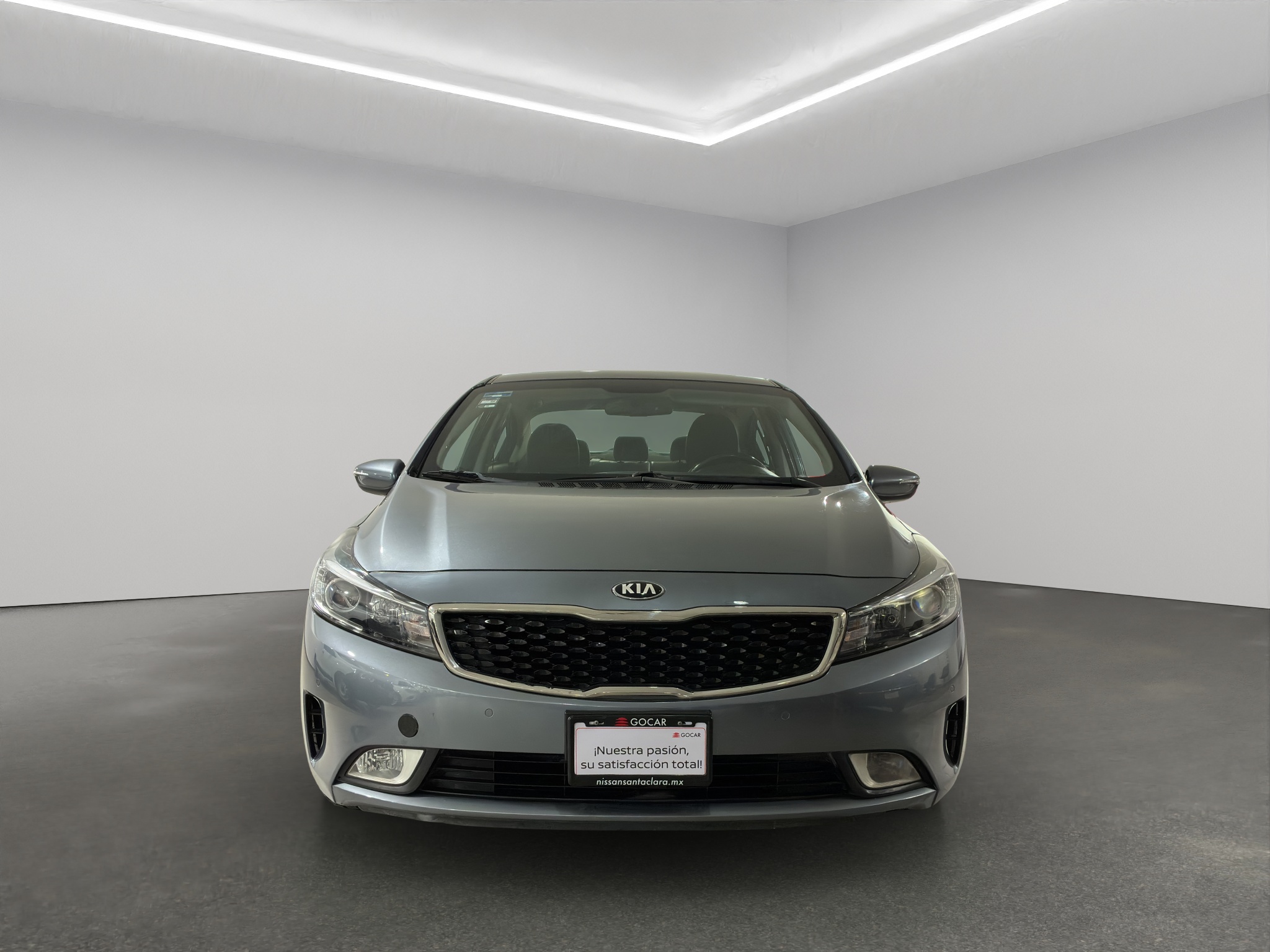 KIA Forte 4 pts. SX, TA, a/ac. Aut., piel, QC, BL, f. niebla, cámara reversa, RA-17 (cambio de línea) 2017