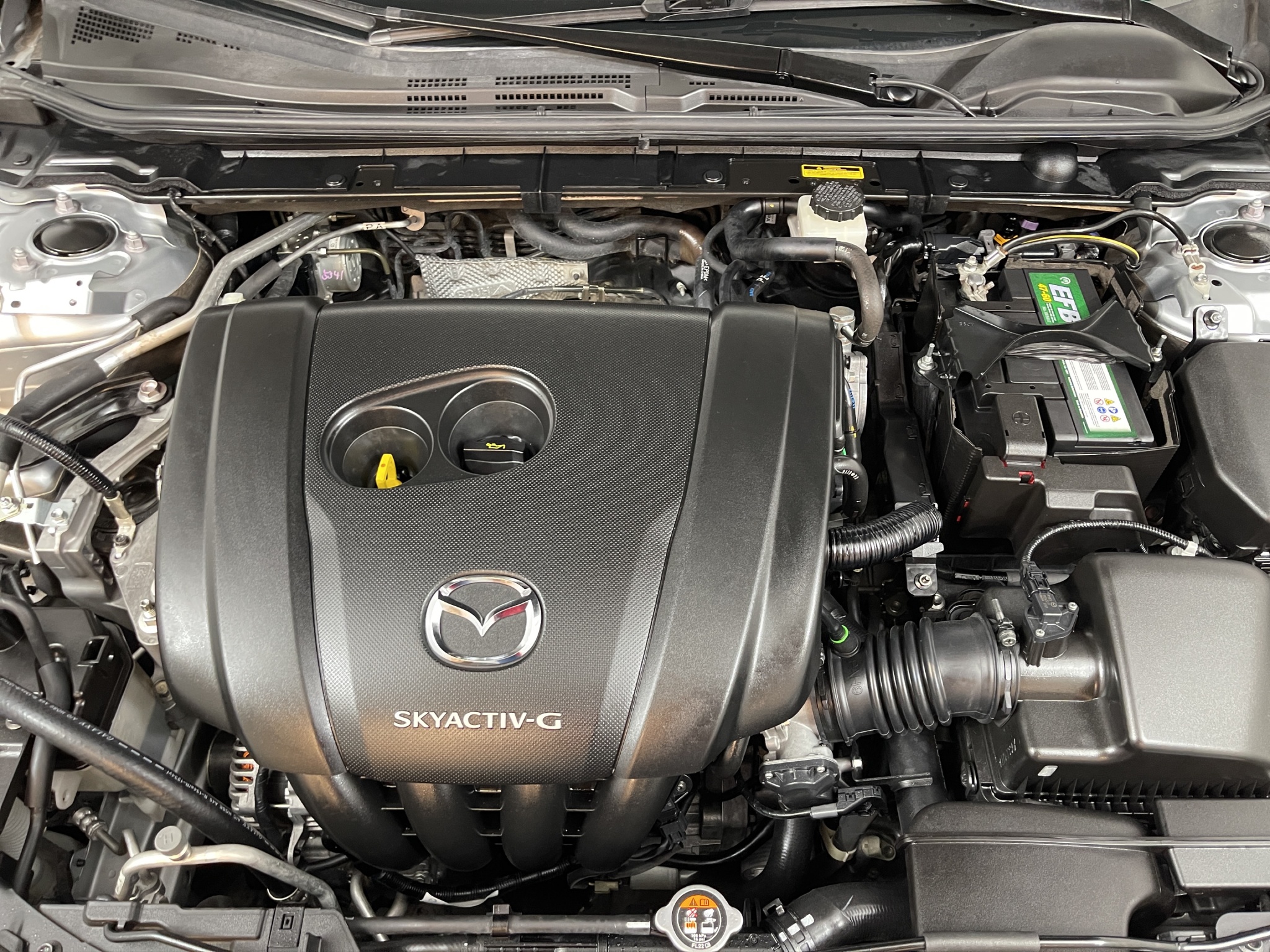 Mazda Mazda 3 4 pts i Grand Touring, 2.5l, TA, QC, GPS, f, lead, RA-18 (linea nueva). 2019