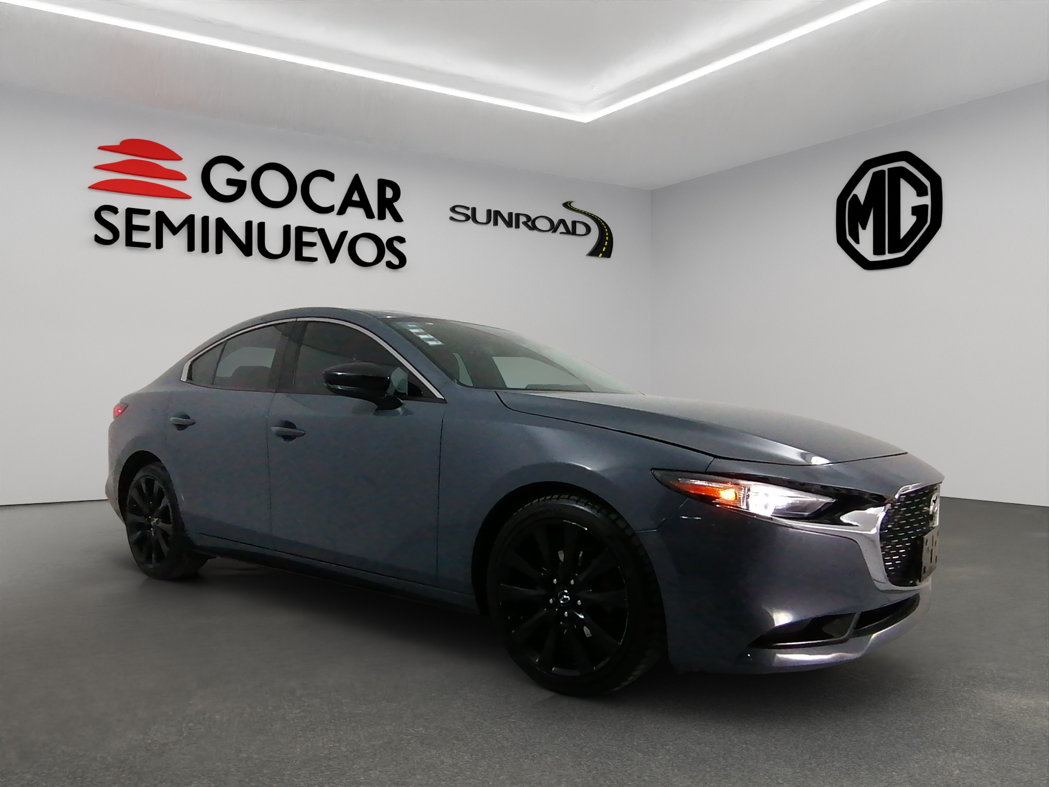 Mazda Mazda 3 4 pts. Signature, 2.5T, TA, piel, QC, s. Bose, f. led, RA-18, 4x4 - GocarCredit