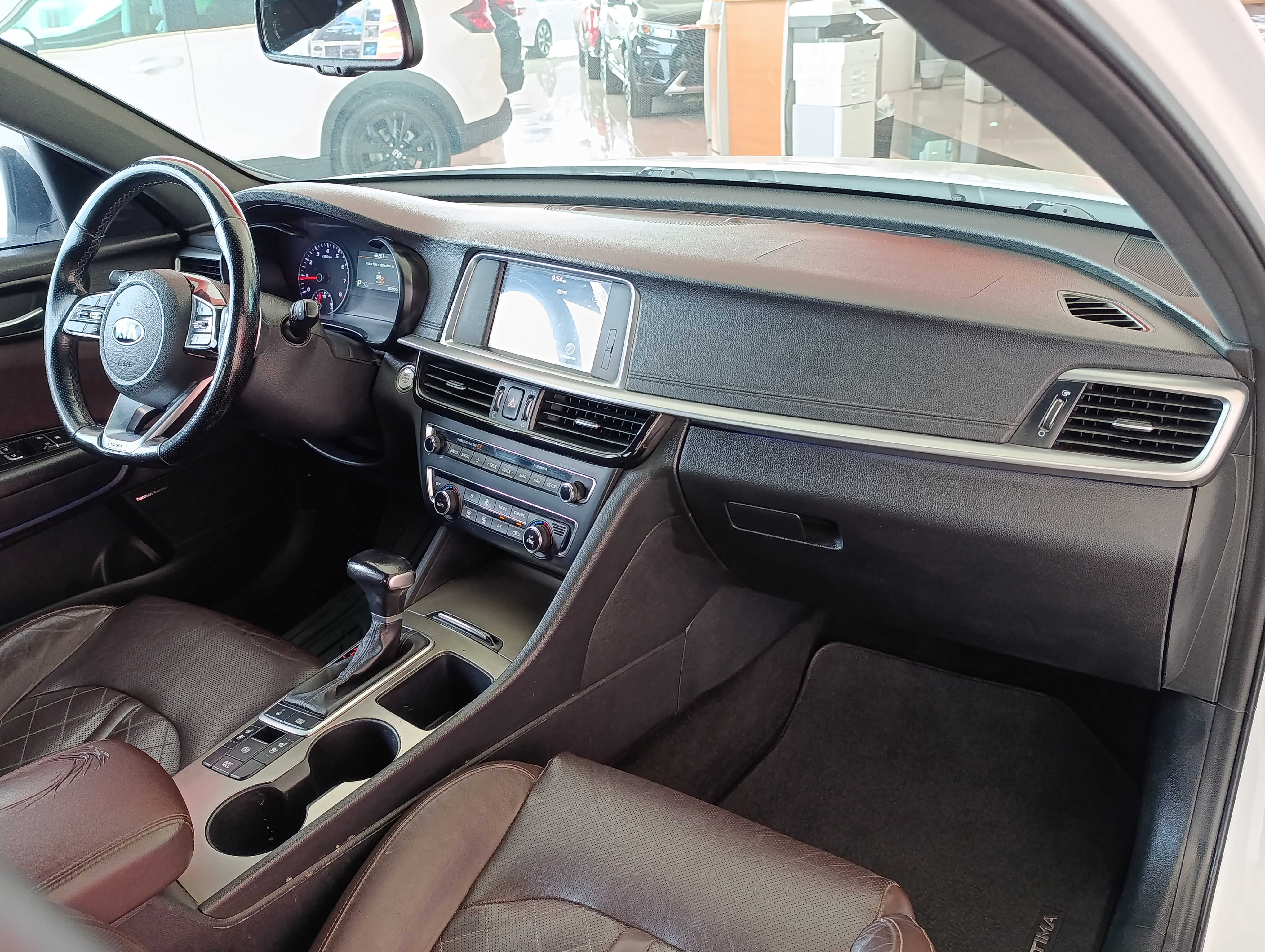 KIA Optima Lateral izquierdo 14