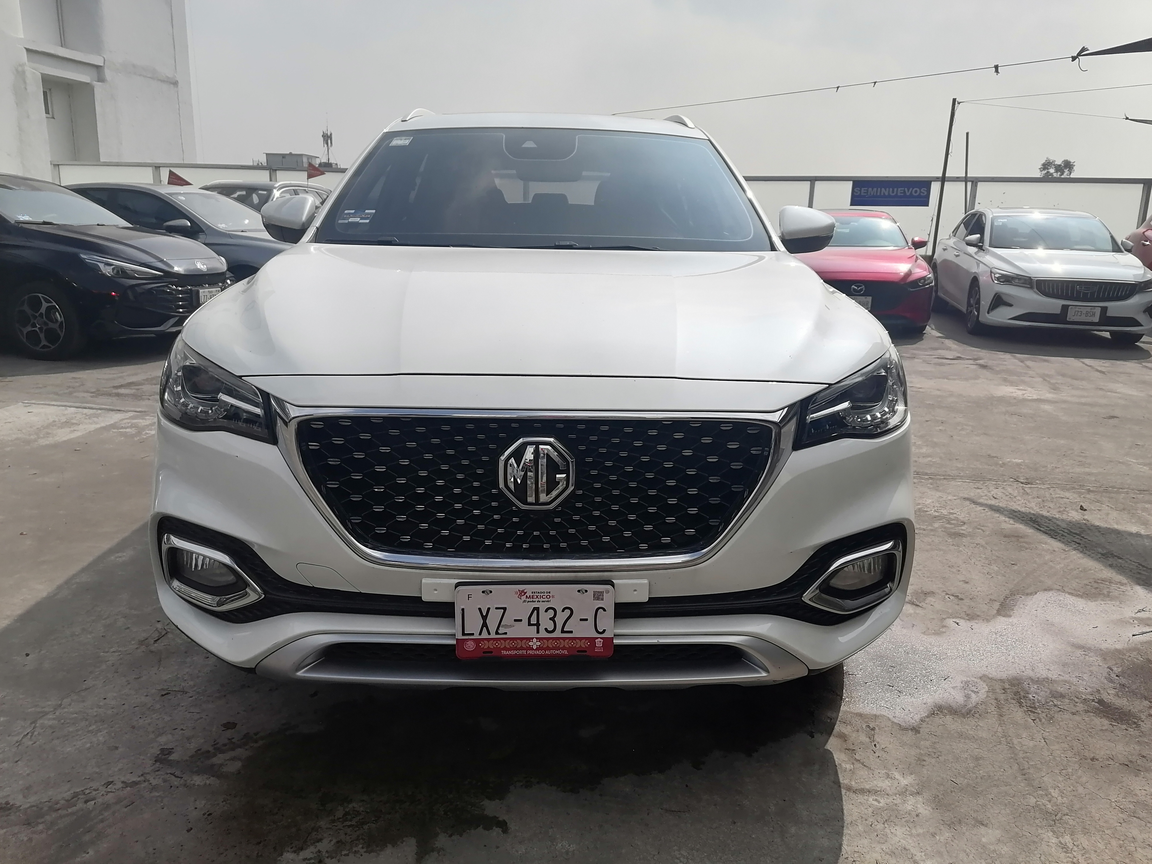 MG